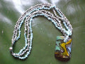 Vintage Glass Pendant and Fresh Water Pearl Necklace Graphic Tee – Everyday Comfort · Top Pick For Any Outfit