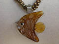 Vintage Murano Style Glass Oceanic Fish Pendant and Fresh Water Pearl Necklace Graphic Tee – Feel-Good Design · Trending Graphic Apparel
