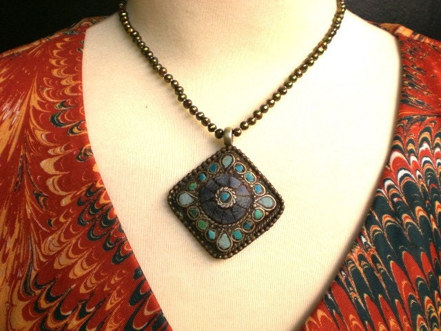 Vintage Fresh Water Bronze Pearl Necklace with Tibetan Hammered Brass and Turquoise Graphic Tee – Fan Favorite · High-Quality Print