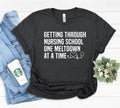 Funny Nurse Shirt Nursing Students Patient Care Gift Nurse Appreciation Gift Getting Through Nursing School One Meltdown At A Time Graphic Tee – Feel-Good Design · Great Gift For Fans
