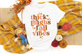 Thick Thighs and fall Vibes Shirt Fall Shirt Autumn Vibes Shirt Fall Shirts Fall Gift Gift For Her Thanksgiving Shirt Thankful Shirt Graphic Tee – Bold Style · Great Gift For Fans