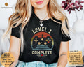 1st Wedding Anniversary Gift for Husband Wife Personalization Level 1 Complete 1 year Anniversary Gift for Gamer Retro Video Game Shirt Graphic Tee – Bold Style · High-Quality Print