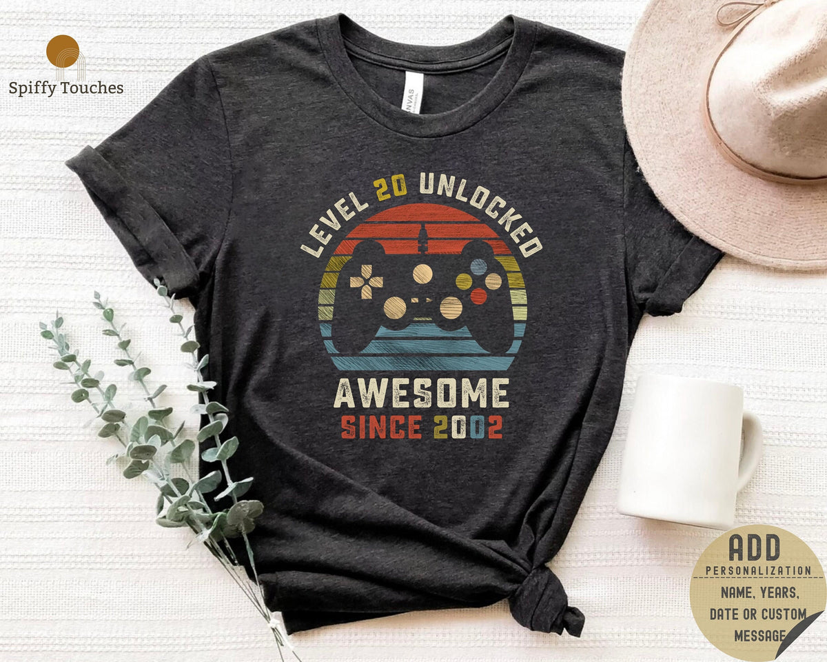 20th Birthday T ShirtLevel Unlocked Shirt Twentieth Birthday Shirt20th Birthday Gift20th Birthday Gamer Shirt Gaming GiftGamer T Shirt Graphic Tee – Warm & Stylish · Great Gift For Fans