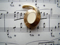 Vintage 70s MONET Gold and White Swirl Brooch Pin Graphic Tee – Fan Favorite · Great Gift For Fans