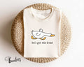 Let39s Get This Bread Funny T Shirt Duck Shirt Meme T shirt Gift Idea Tee Tshirt Bird Nerd Silly Animal Graphic Side Hustle Boss Money Graphic Tee – Aesthetic Look · Trending Graphic Apparel