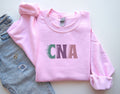 CNA Sweatshirt CNA Shirt CNA Appreciation Gift Valentine Nurse Week Christmas New Cna Graduation Gift Certified Nursing Assistant Sweatshirt – Bold Style · Trending Graphic Apparel