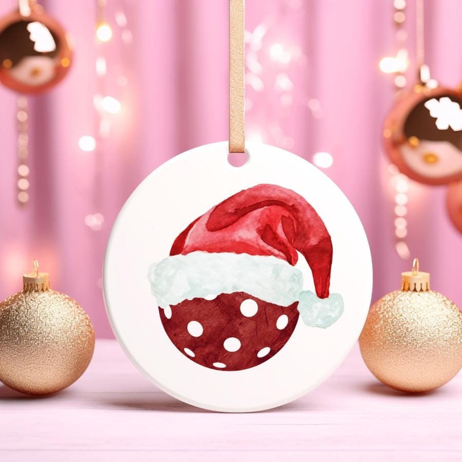 Ceramic Ornaments Pickleball Santa Hat Christmas Ornament Holiday Decor 2 Sided Print Red Festive Decoration Gift Idea Graphic Tee – Fan Favorite · High-Quality Print