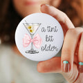 A Tini Bit Older Martini Birthday Pin Button Celebration Pin Martini Birthday Party Custom Pin Button Personalized Badge Party Favor Graphic Tee – Fan Favorite · Great Gift For Fans