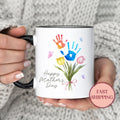 Mother39s Day Mug Gift for New Mom Family Handprint Coffee Cup Unique Mom Gift Colorful Floral Design Keepsake for HerMU 329 Graphic Tee – Soft Feel · Trending Graphic Apparel