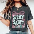 Stay Salty Shirt Coastal Beach Seashell Aesthetic Shirt Checkered Bow Boho Summer Shirt Retro Summer Shirt Coquette Summer Beach Tee Graphic Tee – Warm & Stylish · High-Quality Print