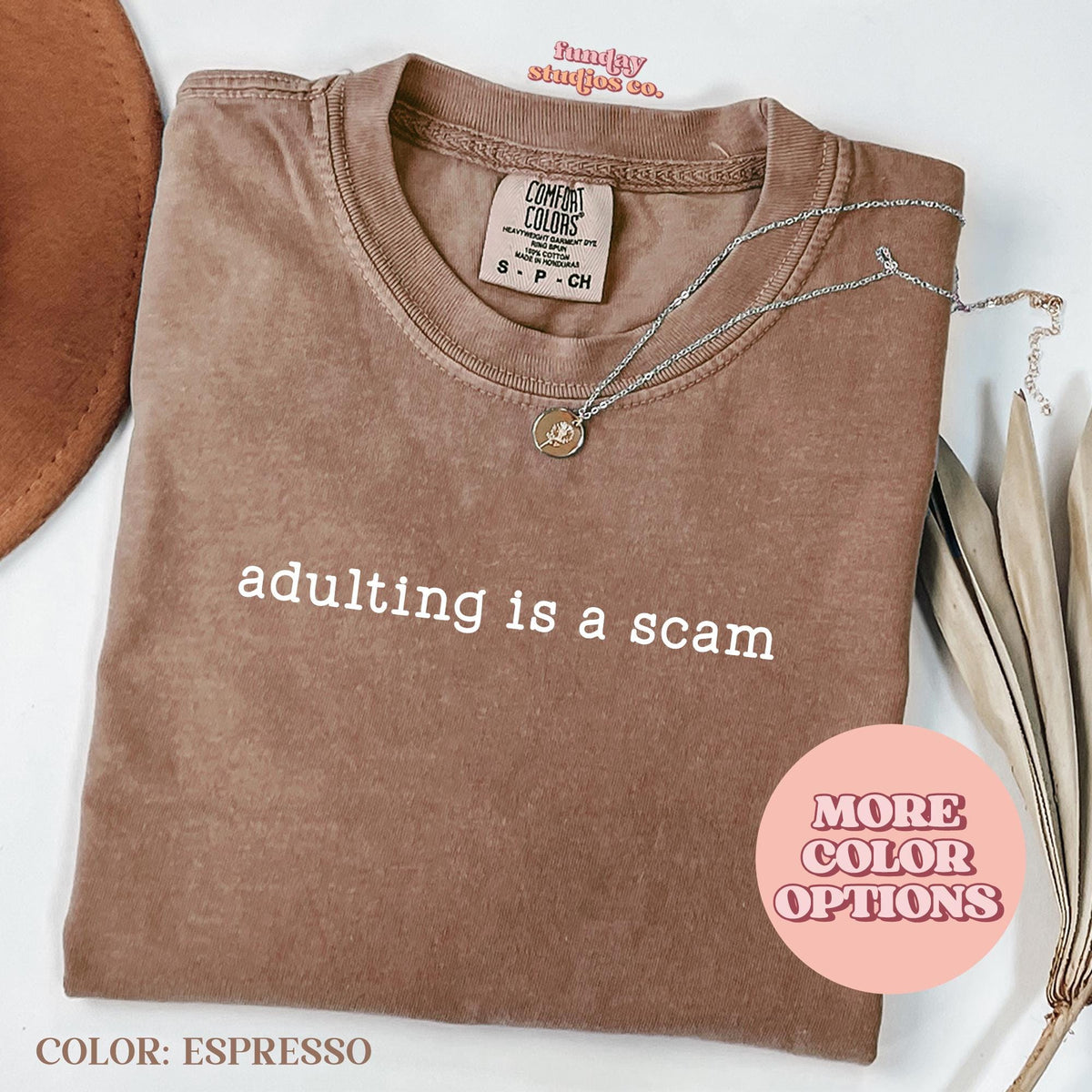 Adult T Shirt Ivory Trendy Oversized Shirt Adulting is a Scam Graphic T Shirt Casual Unisex TeeAP TRE84 Graphic Tee – Premium Graphic · Perfect For Daily Wear