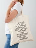 The secret dear Alice is to surround yourself with people who make your heart smile Alice in Wonderland quote Tote Bag