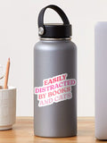 Easily distracted by books and cats Sticker